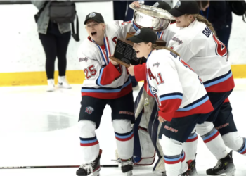 Liberty celebrates their ACHA title - Photo @ Liberty Athletics